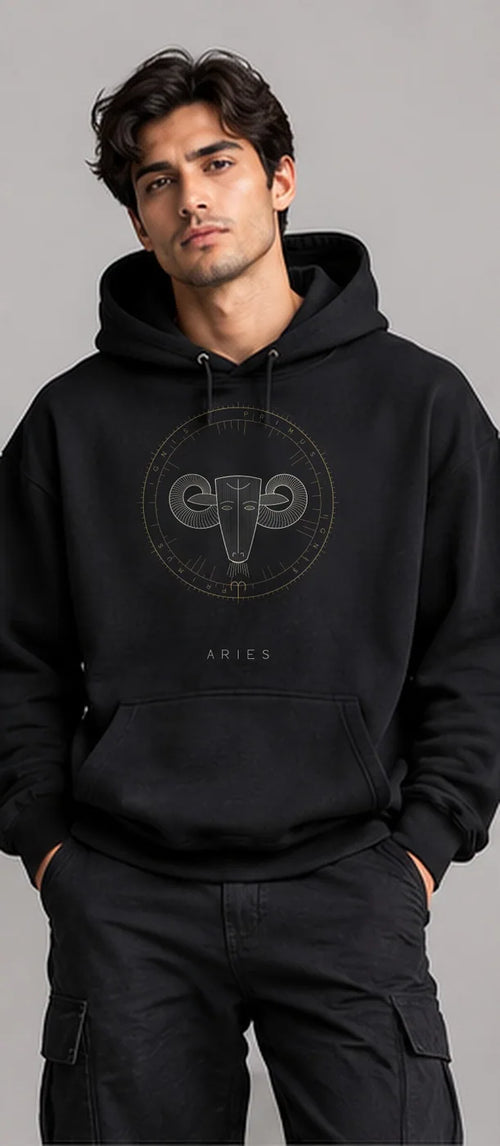 Model wearing the Oztra Aries hoodie in black