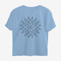 Oztra Bloom sky blue oversized tee, front view showing the Bloom print
