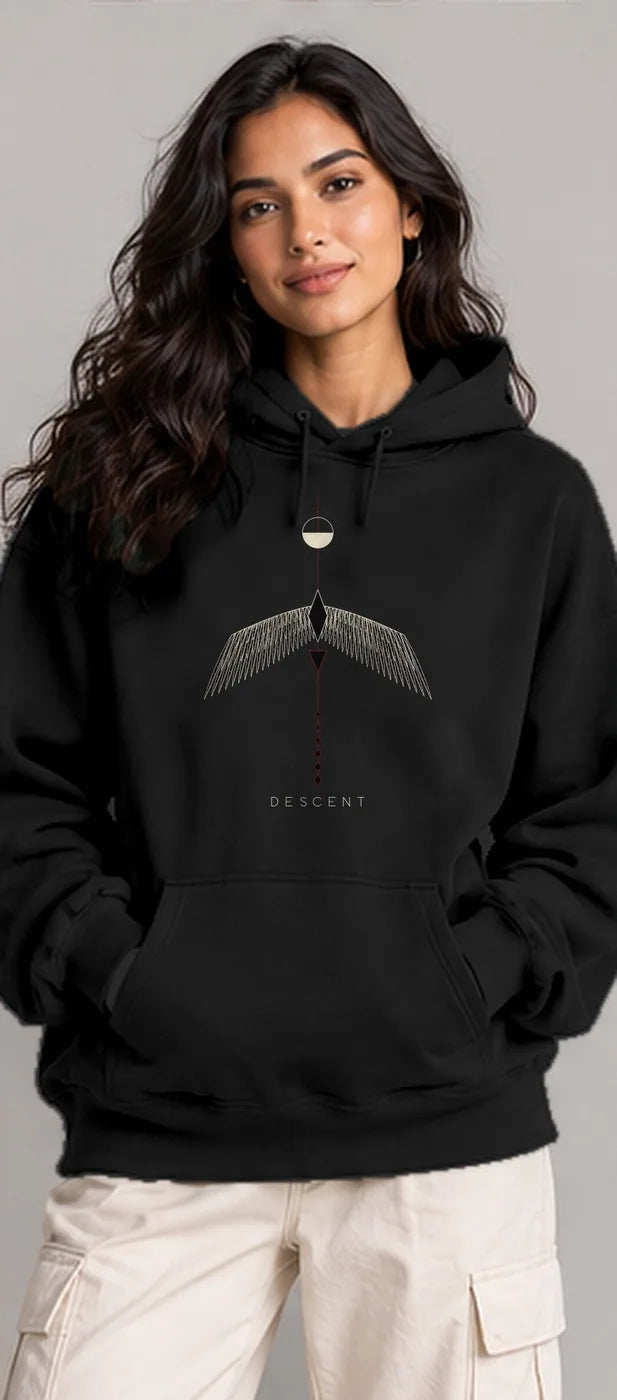 Model wearing the Oztra Descent hoodie in black