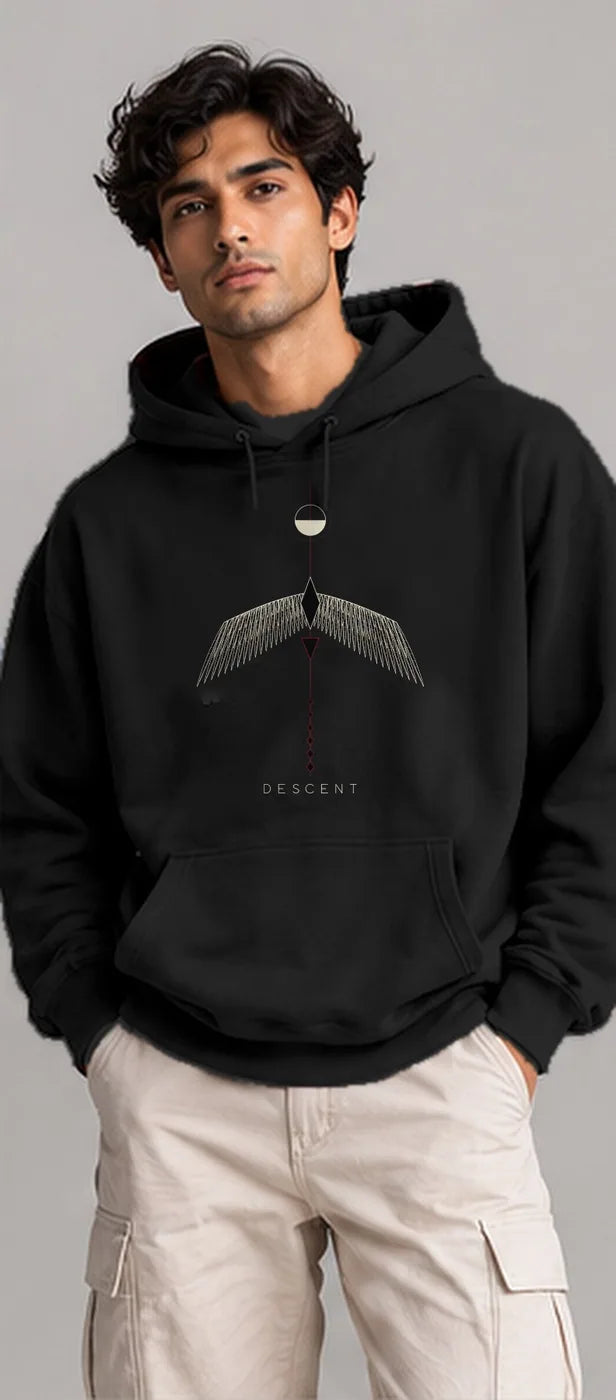 Model wearing the Oztra Descent hoodie in black