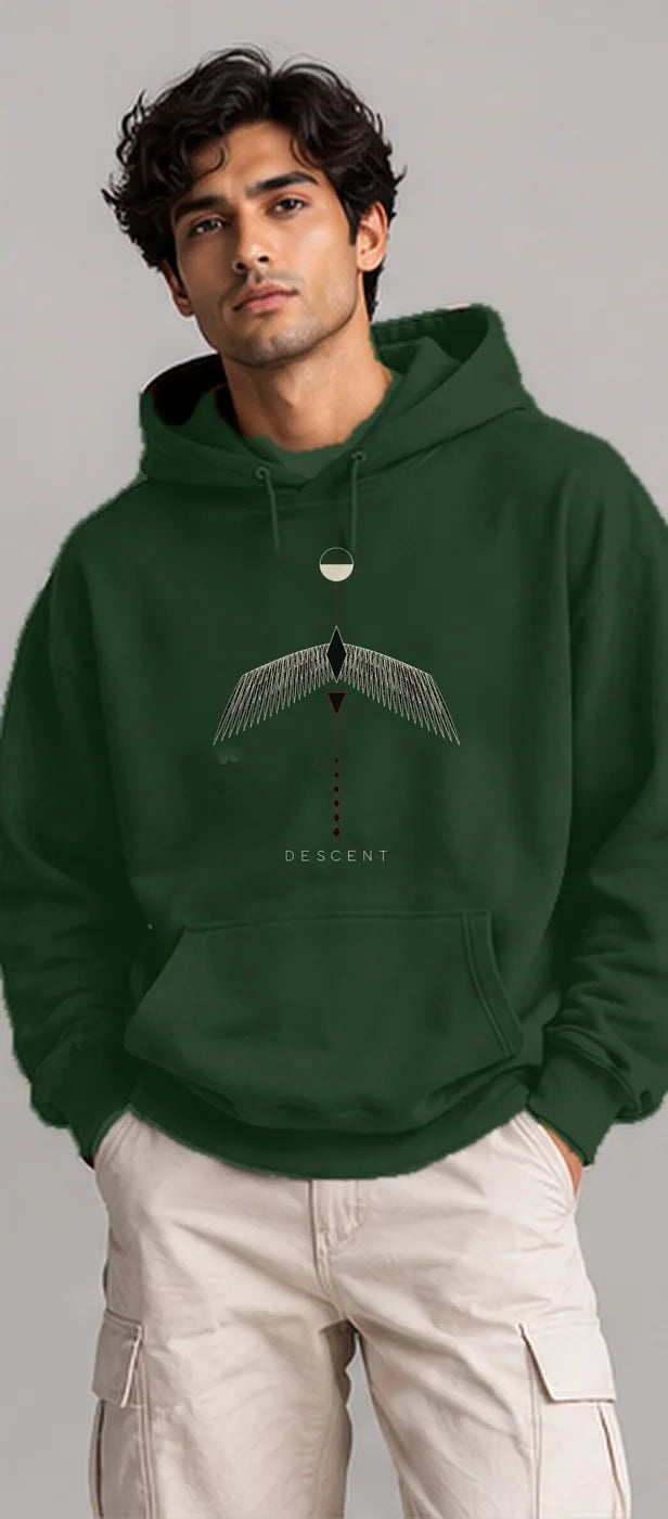 Model wearing the Oztra Descent hoodie in bottle green