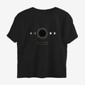 Oztra Eclipse black oversized tee, front view showing the Eclipse print