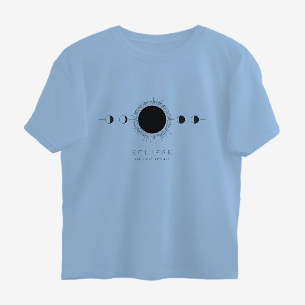 Oztra Eclipse sky blue oversized tee, front view showing the Eclipse print