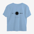 Oztra Eclipse sky blue oversized tee, front view showing the Eclipse print