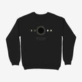 Oztra Eclipse black sweatshirt, front view showing the Eclipse print