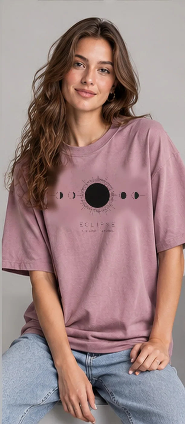 Model wearing the Oztra Eclipse tee in dusty pink