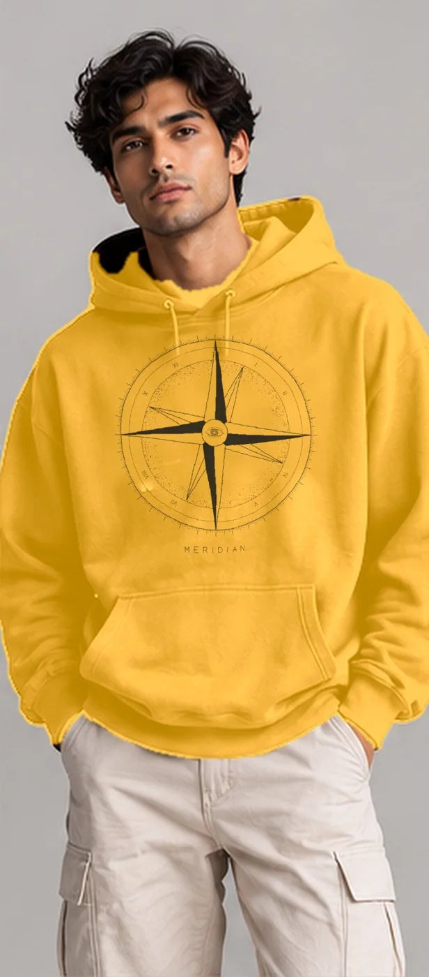 Model wearing the Oztra Meridian hoodie in mustard