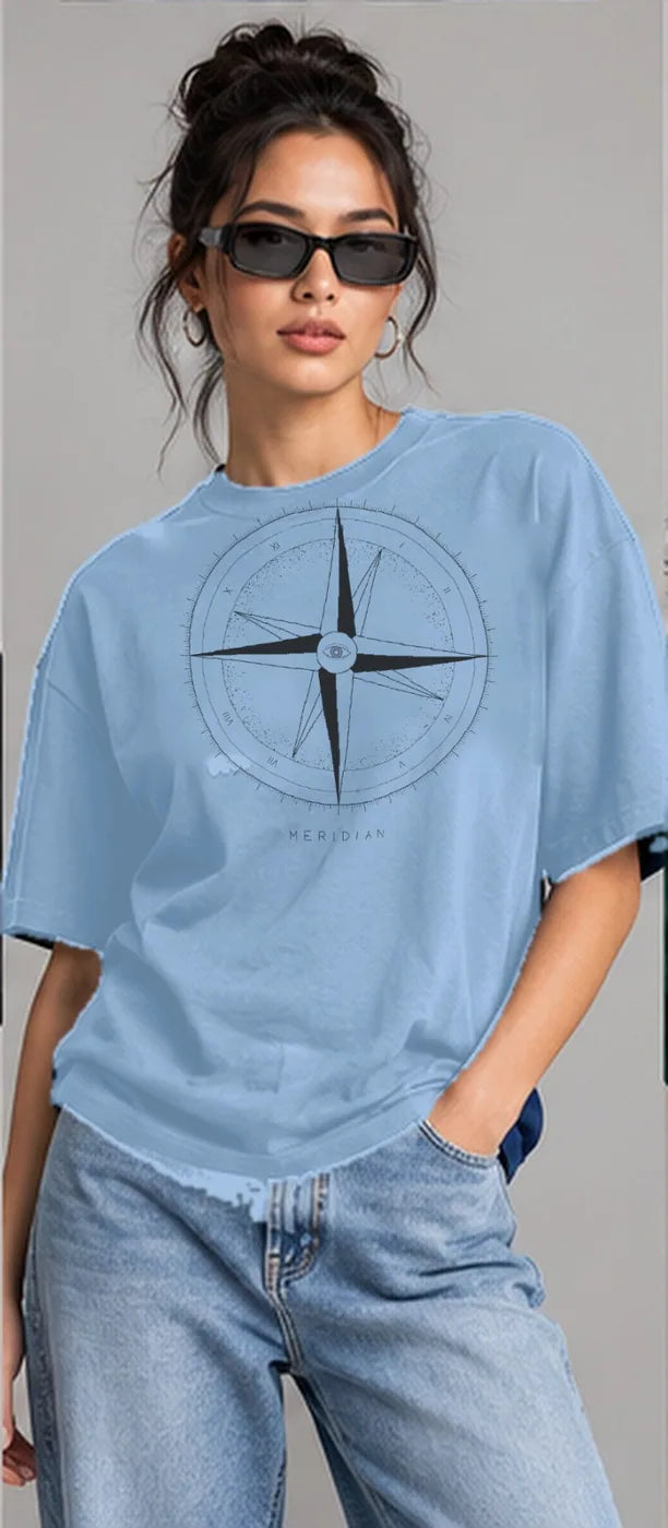 Model wearing the Oztra Meridian oversized tee in sky blue