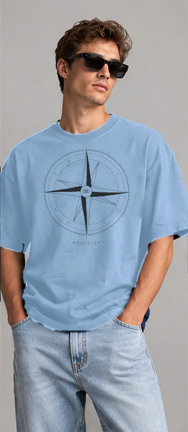 Model wearing the Oztra Meridian oversized tee in sky blue