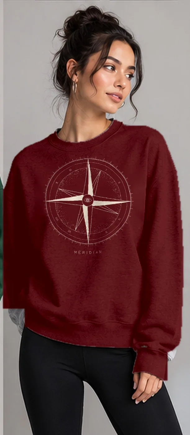 Model wearing the Oztra Meridian sweatshirt in maroon