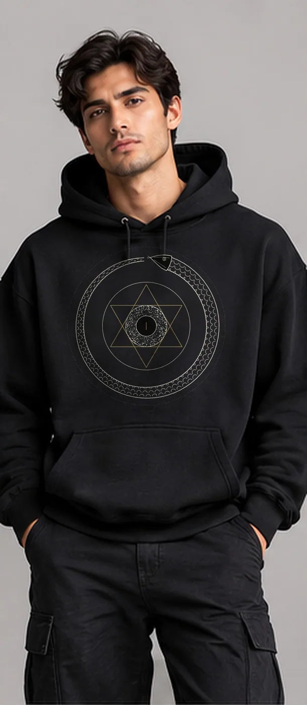 Model wearing the Oztra Ouroboros hoodie in black