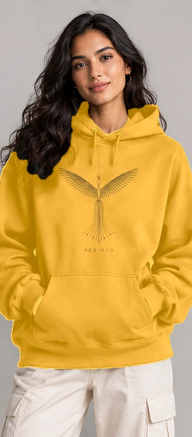 Model wearing the Oztra Rebirth hoodie in mustard