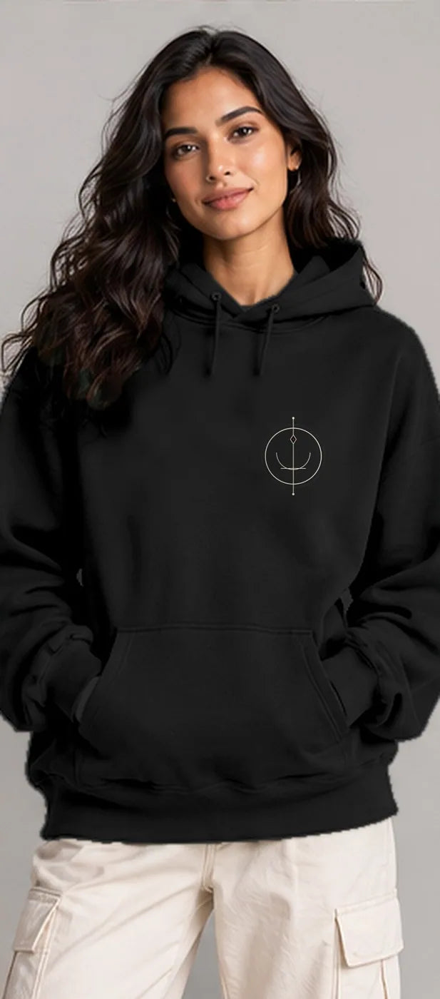 Model wearing the Oztra Sigil hoodie in black
