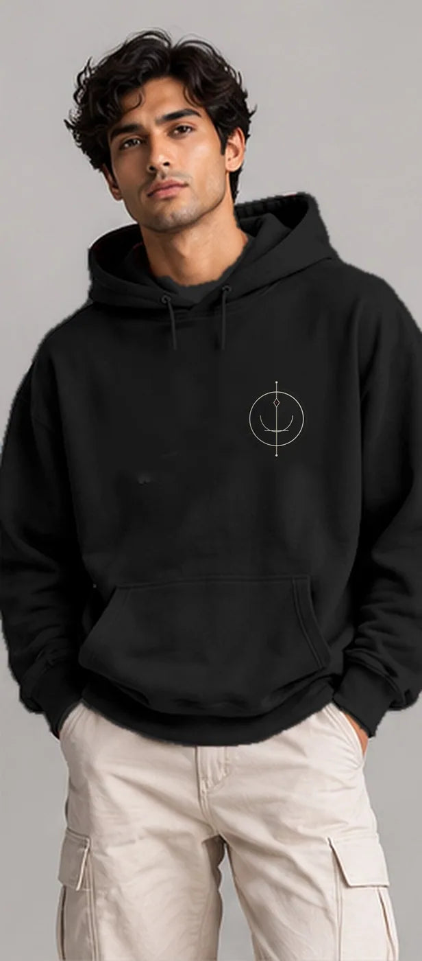 Model wearing the Oztra Sigil hoodie in black