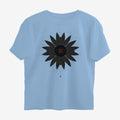 Oztra Vigil sky blue oversized tee, front view showing the Vigil print