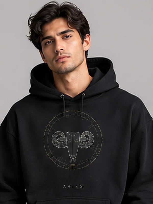 Model wearing the Oztra Aries hoodie in black