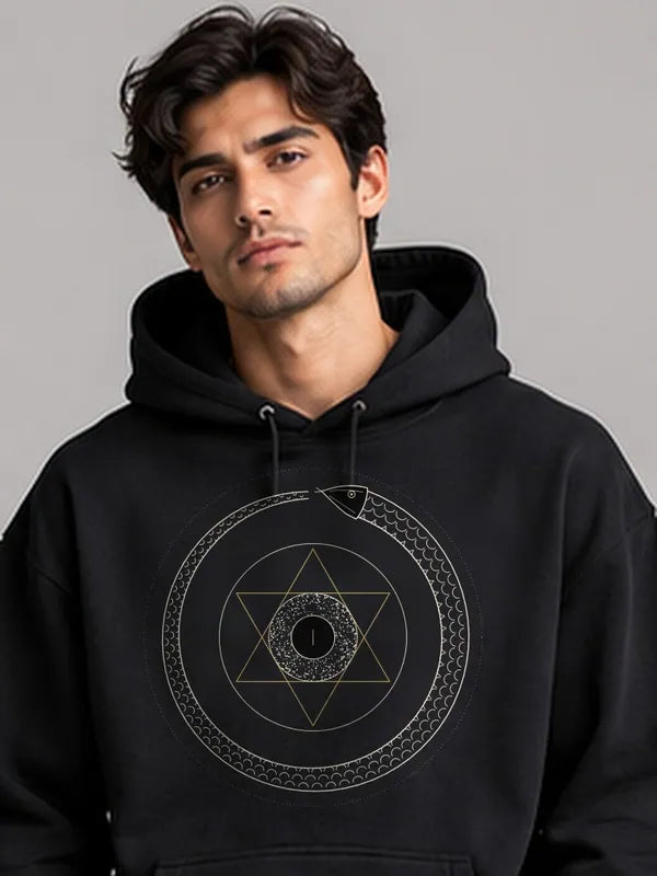 Model wearing the Oztra Ouroboros Hoodie in black